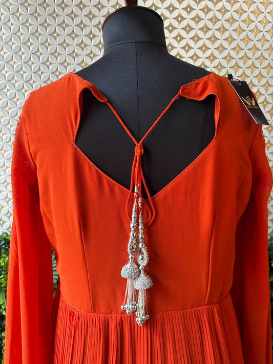 Regal Rust Pleated Gown with Embellished Cape Sleeves by Lable Rosaya