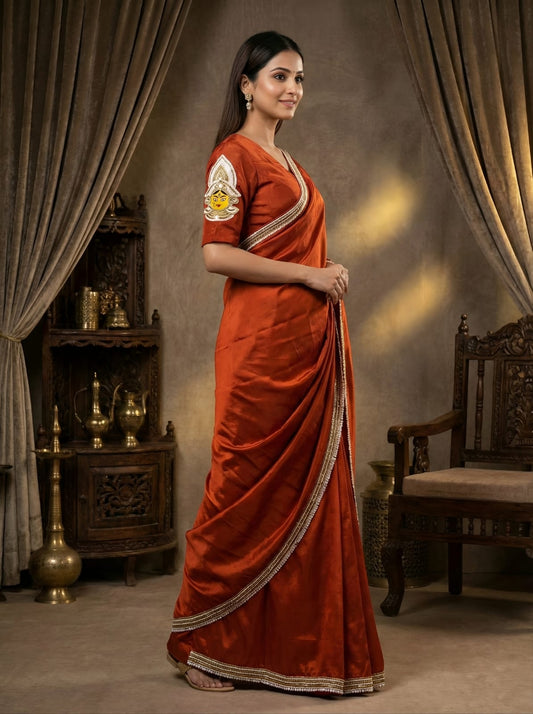 Rosaya Rust Silk Bridal Saree with Goddess Durga Sleeve Embroidery