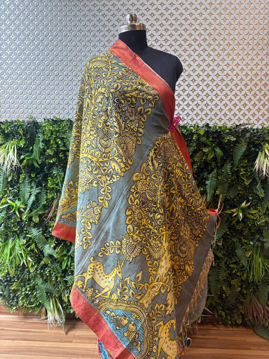 Full view of the Meera Kalamkari dupatta, showcasing the complete Tree of Life block print in yellow on a grey base with a contrasting rust border