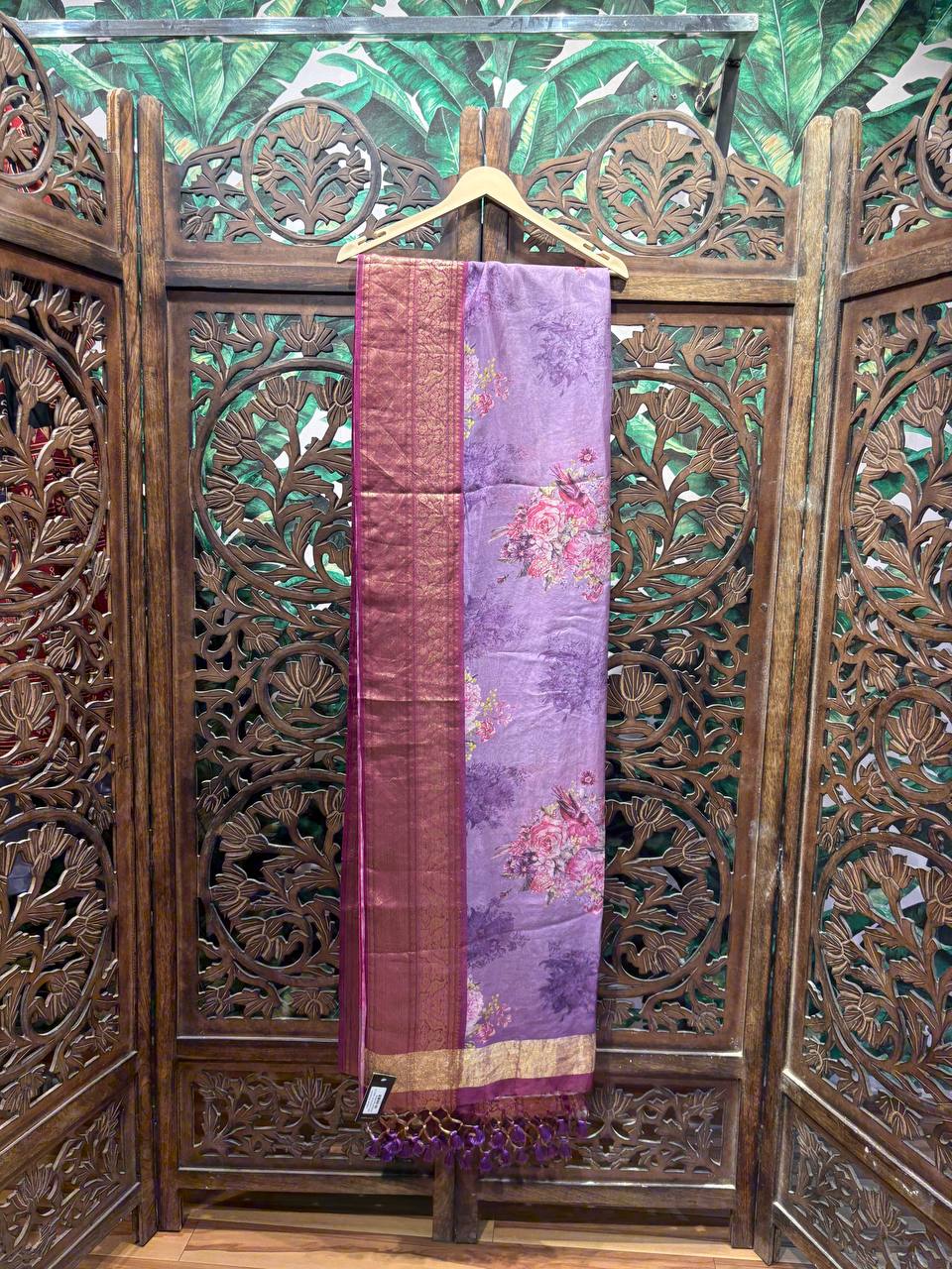 Full view of a lavender floral organza saree with a wide magenta Banarasi Zari border.