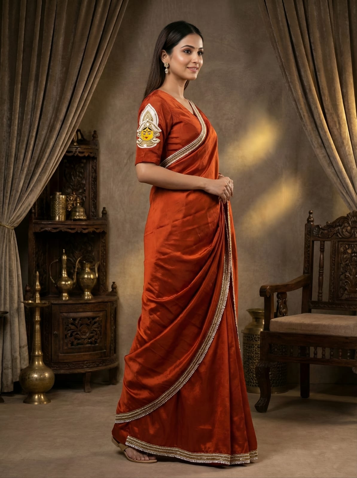 Rosaya Rust Silk Bridal Saree with Goddess Durga Sleeve Embroidery