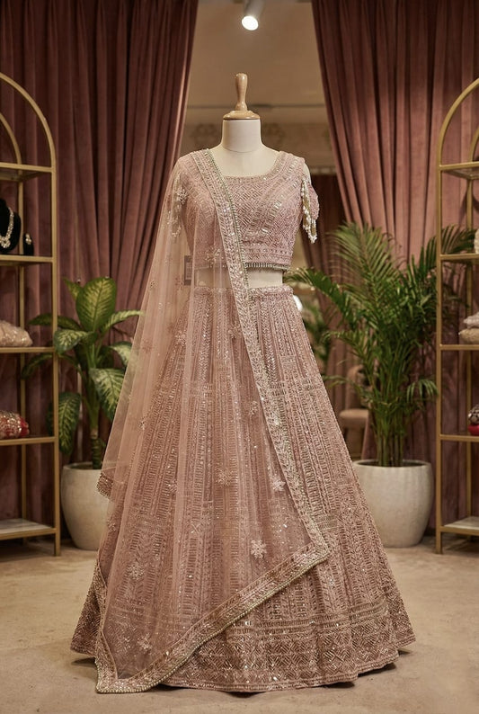 Sapphire blue Rosaya bridal lehenga with heavy gold zardozi embroidery on mannequin.